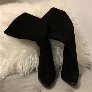 Colin Stuart high heeled suede boots.